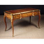 A Fine Marquetry Bureau Plat inlaid with trailing flowers and cross-banding edged in stringing,