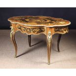 A Decorative 19th Century Marquetry Serpentine Table with gilt metal mounts in the Louis XV style.