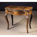 A Fine 19th Century Marquetry Card Table decoratively inlaid with musical instruments,