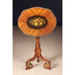 A 19th Century Tulipwood & Marquetry Tilt-top Table with gilt bronze mounts.