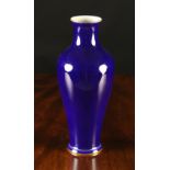 A Sèvres Bleu Lapis Glazed Vase of rising baluster form with gilt rim lines,