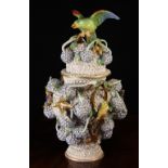 A Large Paris Porcelain Copy of a Meissen Jar & Cover encrusted with fleurettes and pom-poms of