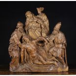 A Fine 15th Century Oak Retable Carving of 'The Disposition of Christ': depicting Chirst's flaccid