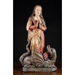 A 16th Century French Polychromed Wood Carving of Saint Marguerite & The Dragon, Lorraine,