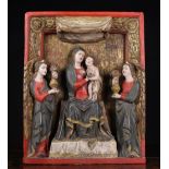 An 18th Century Italian Polychromed Bas Relief carved with enthroned Virgin & Child flanked by