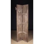 A 15th Century Oak Bi-fold door with vertical moulding, 73 ins (185 cms) high,