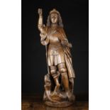 A Flemish Wood Carving of Saint George & The Dragon, Circa 1500, 39 ins (99 cms) in height.