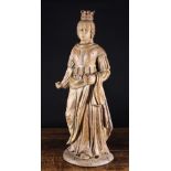 A 17th Century Oak Carving of a Crowned Female Saint, 30 ins (74 cms) in height.