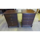 A pair of stag four drawer bedside chest