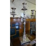 A singular three light candelabrum
