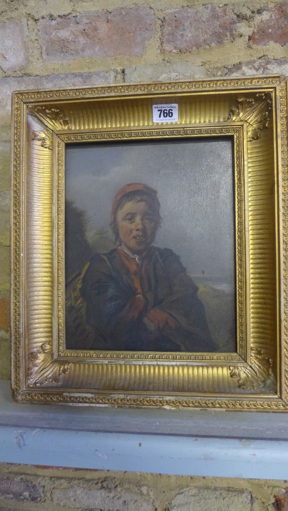 A gilt framed oil on panel portrait of a