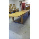 A large oak extending table - extending