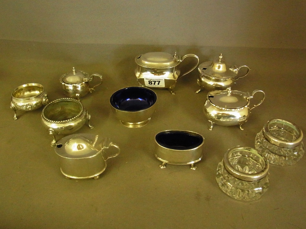 A collection of eleven silver salts and