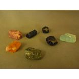 A collection of raw un-cut Gemstones inc