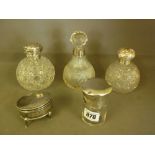 A collection of silver and glass scent a