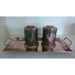 A pair of copper Arts and Crafts caddies