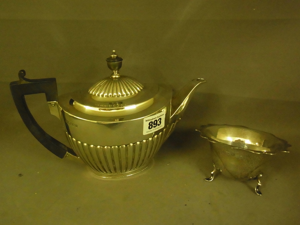 A silver tea pot - Hallmarked Sheffield