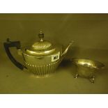 A silver tea pot - Hallmarked Sheffield