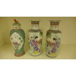 A pair of famille rose well decorated va