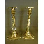 A pair of Sterling silver candlesticks w