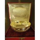 A silver embossed bowl - Height 7 cm x D