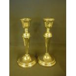 A pair of hallmarked silver candlesticks