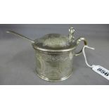 A silver drum shaped mustard pot with ch