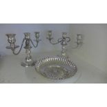 A pair of silver plated table candelabra