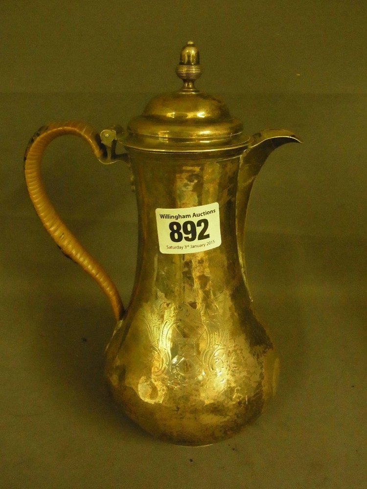 A George II silver hot water jug - Hallm