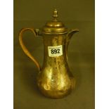 A George II silver hot water jug - Hallm