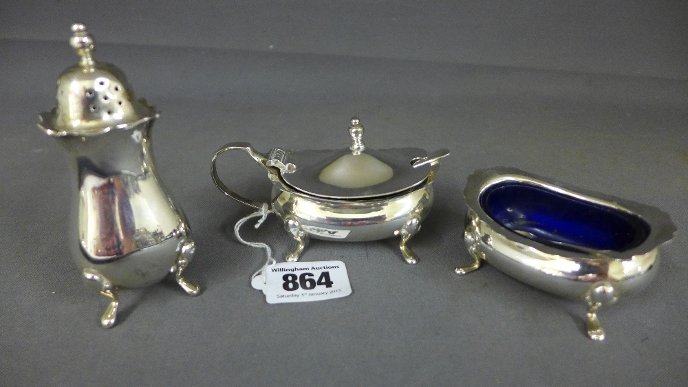 A silver three piece cruet set - Birming