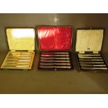 Three boxed sets of silver handled butte