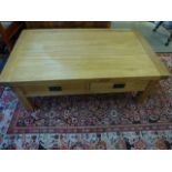 An oak twin sided coffee table W 120cm x