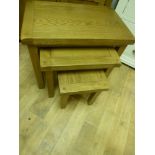 A set 3 of oak nest of tables