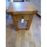 An oak lamp table W 42cm D 33cm x H 60cm