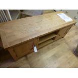 An oak plasma tv unit with slight scratc