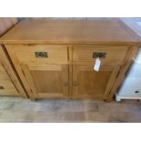 An oak two door sideboard W 100cm x D 46