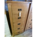 An oak five drawer tallboy W 55cm x D 40