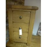 An oak three drawer bedside W 45cm x D 4