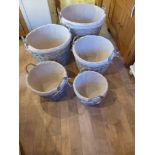 Five corresponding wicker baskets