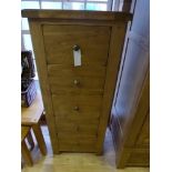 An oak five drawer tallboy W 55cm x D 40