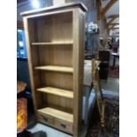 An oak bookcase W 89cm x D 30cm x H 190c
