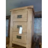 An oak three drawer bedside W 45cm x D 4