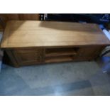 An oak plasma tv unit W 134cm x D 45cm x