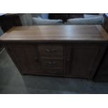 An oak three drawer sideboard W 135cm x