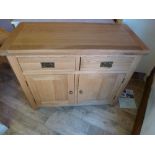 An oak two door sideboard W 100cm x D 46