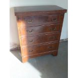 A mahogany Bachelor chest with a fold ov