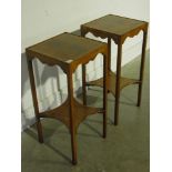 A pair of modern walnut plant stands or
