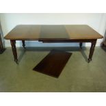 A 19th century mahogany pullout dining t