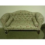 A Victorian style floral upholstered but